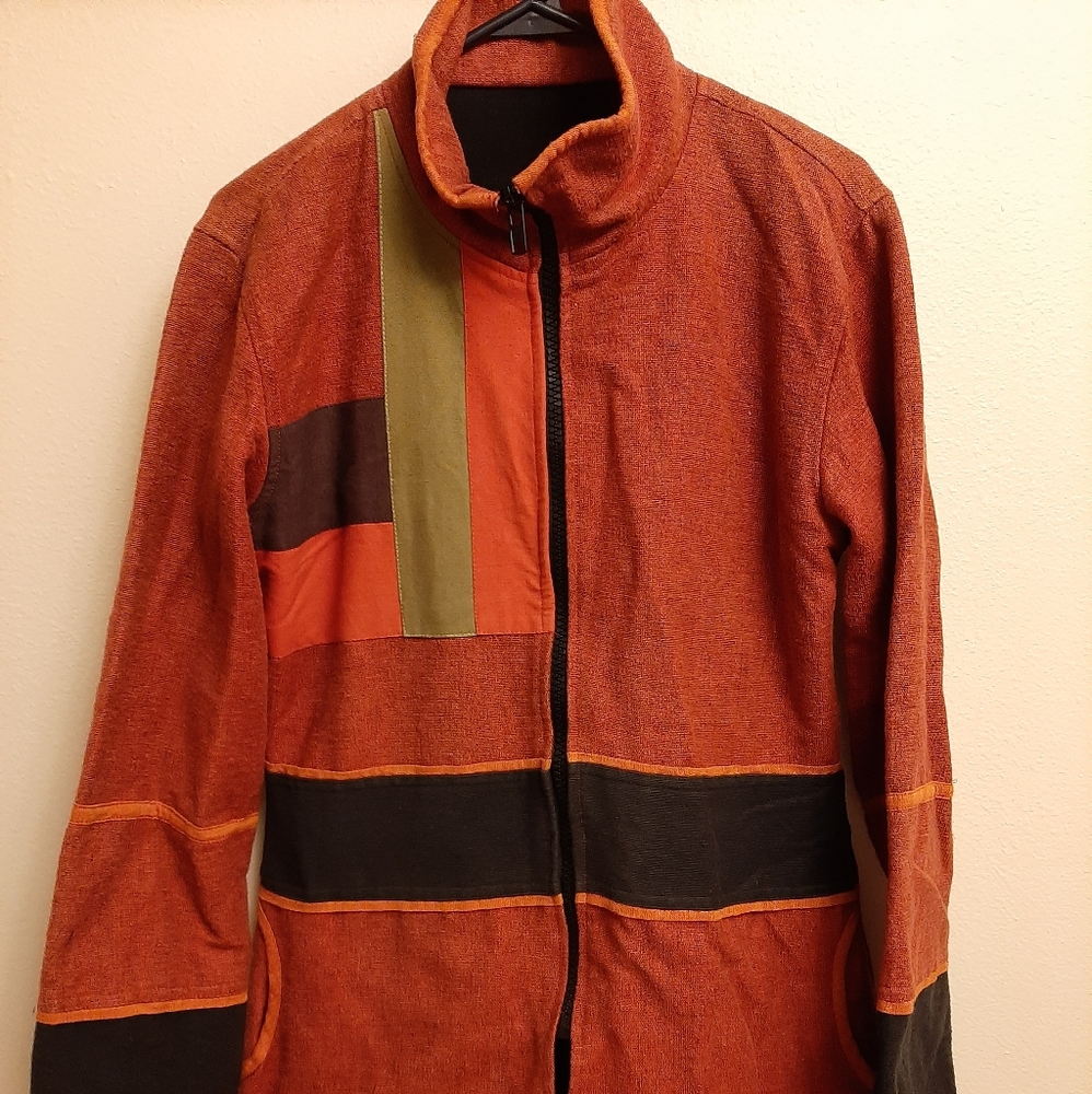 Orange, thick jacket. No name brand.